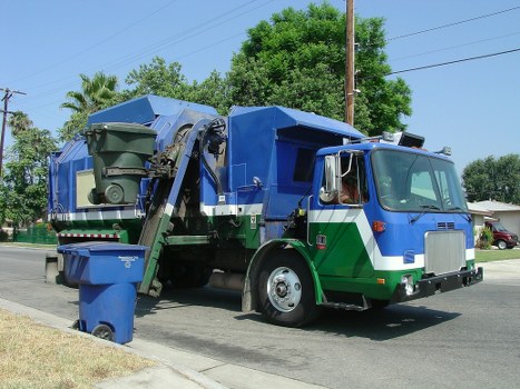 Waste removal team clearing household rubbish in Balham